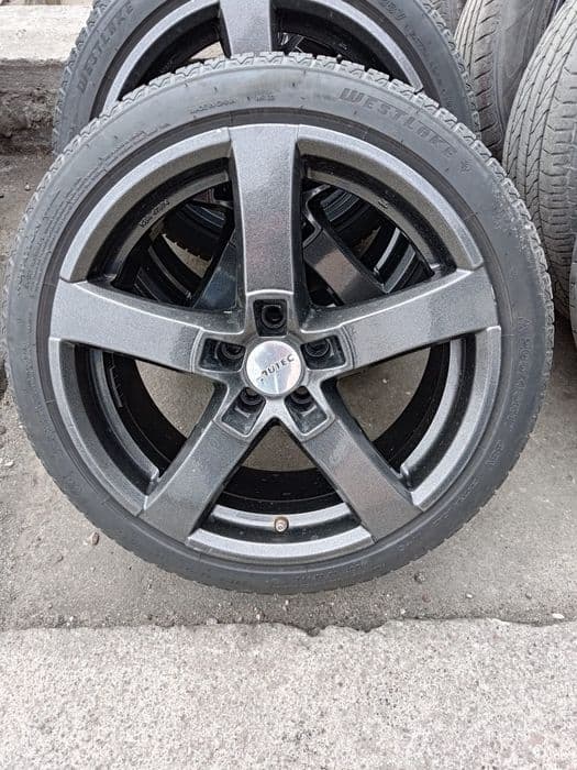 Komplet felg 5x100 ET38 7.5j z oponami