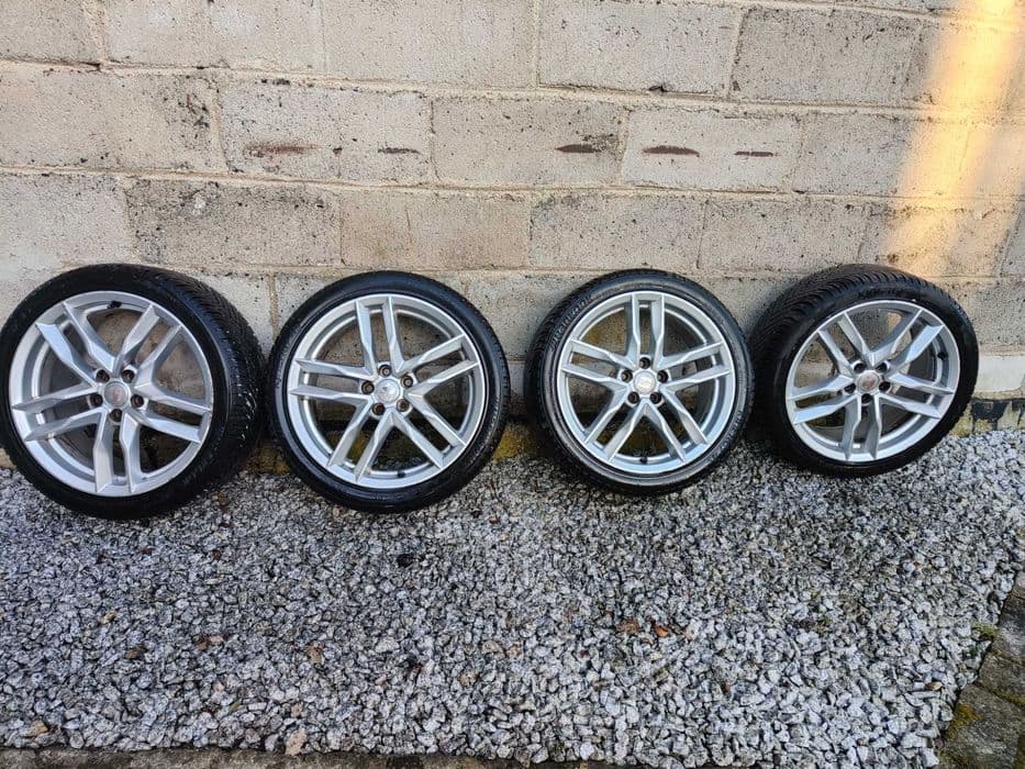 Opony wielosezonowe 215/40 R17 + felgi aluminiowe 5x100 Seat Ibiza