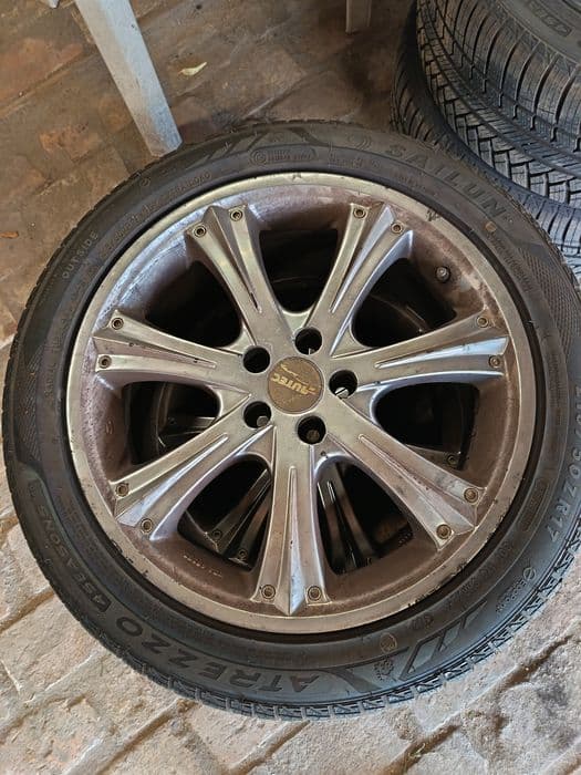 Felgi aluminiowe 17 5x100 et 38  +nowe opony całoroczne 215x50 r17