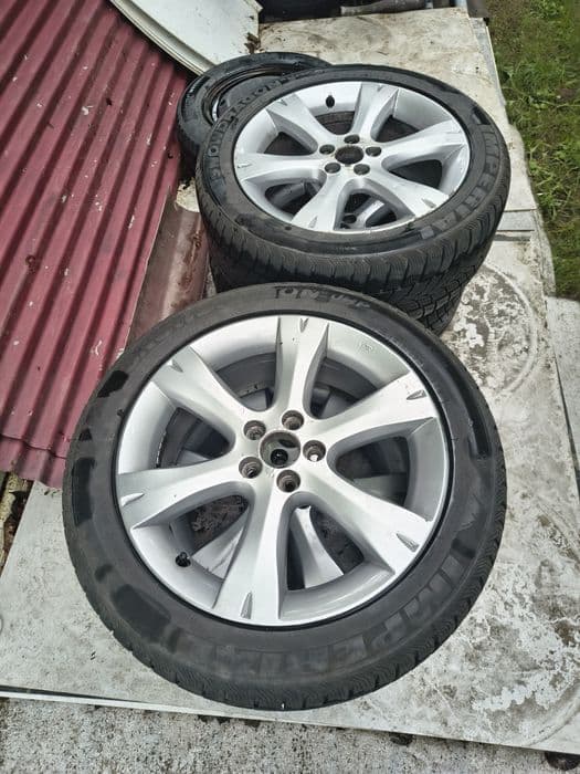 Felgi 17 Subaru 5 x 100. 17 opony zimowe prawie nowe.