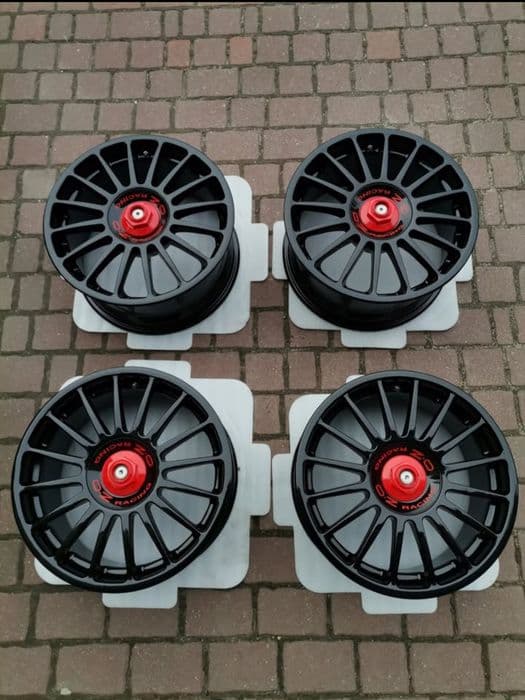 Oz Competition 17'' 5x100/5x112 Central lock .Śliczne Czarny fortepian